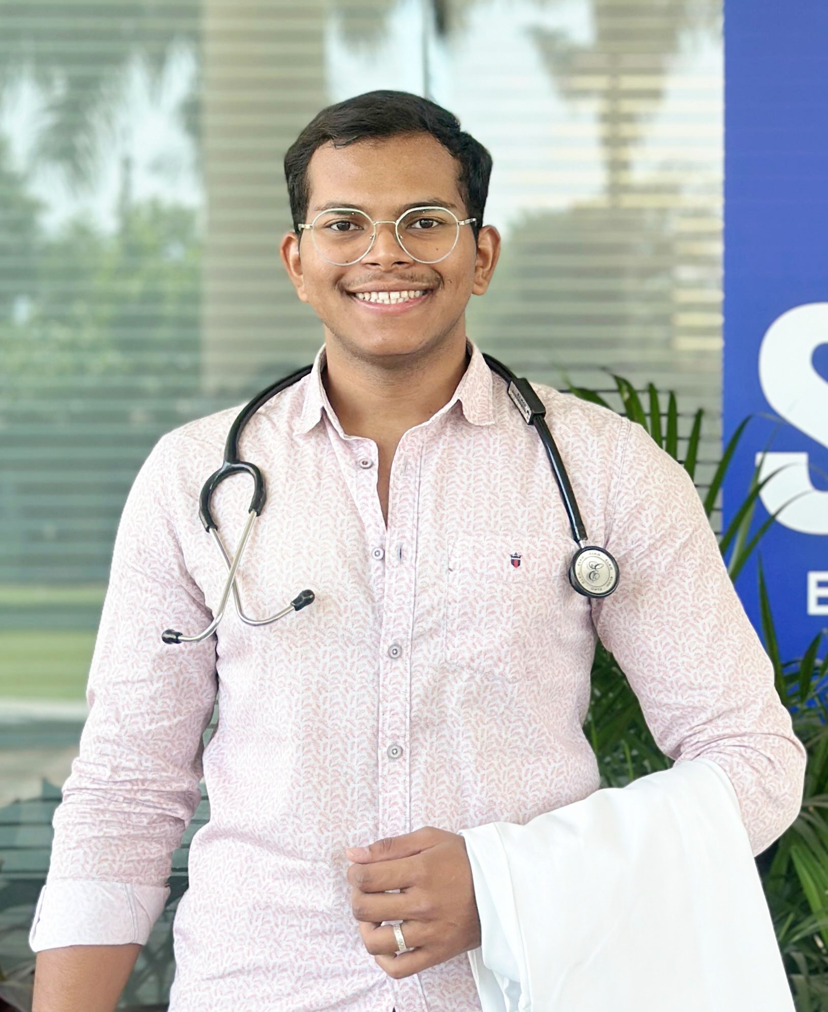 Dr Tushar
